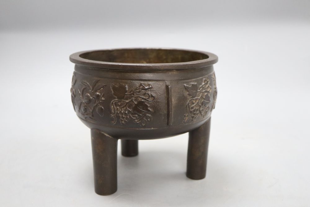 A Chinese late Ming bronze ding censer, height 15cm